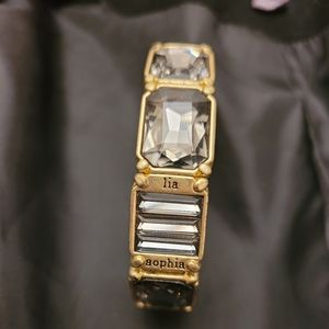 Gorgeous matte gold tone bracelet with smoky crystals